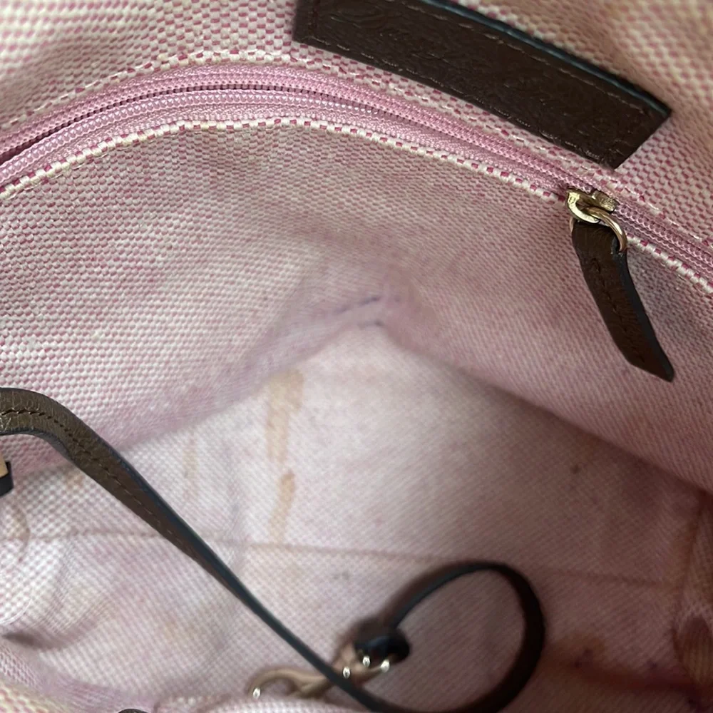 Dooney and Bourke. Brown leather shoulder bag. Has interior stains. - Picture 10 of 14